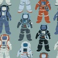 Seamless pattern with astronauts. Collection of cosmonauts in colorful space suits. Royalty Free Stock Photo